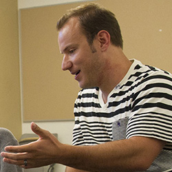 Brad Smith speaking with another student